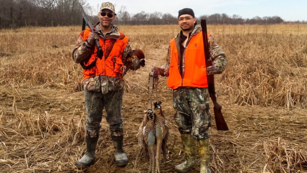 African American game hunters with regular rifles. Credit NYCityLens.com _ Pinterest - Copy