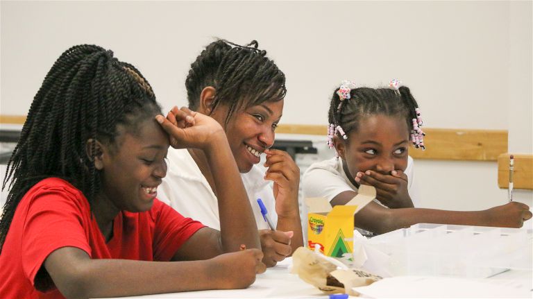 Girls Embracing Mothers