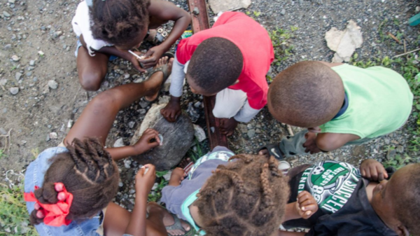 Children playing a game in Haiti