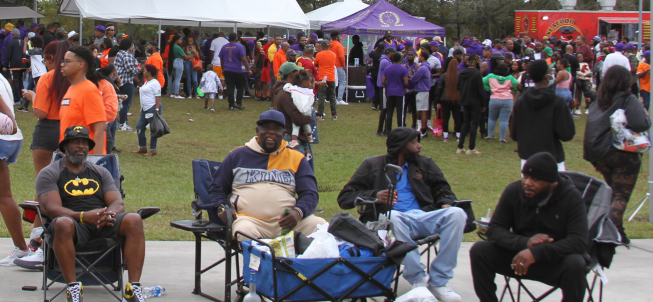 The men of Omega Psi Phi at their annual tailgate at the Florida Classic