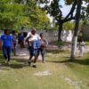 Employees of the nonprofit Capracare transport a person injured in a Dec. 21 earthquake that struck southwestern Haiti.