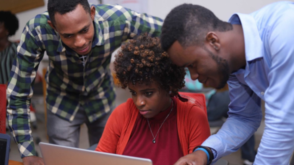 Three Ayiti Analytics students