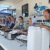 Members of Christian Aid Ministries preparing meals