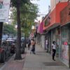 Shoppers stroll down Flatbush Avenue