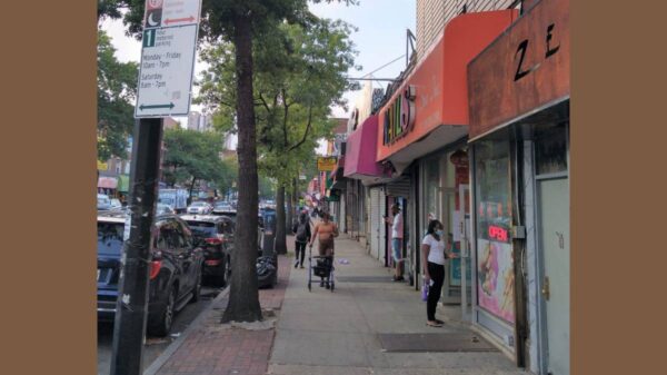 Shoppers stroll down Flatbush Avenue