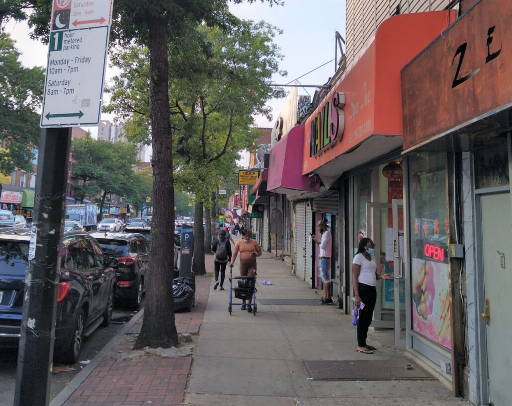 Shoppers stroll down Flatbush Avenue