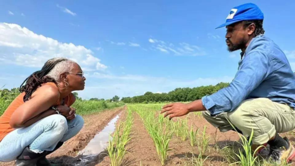 Konda Mason with farm manager Myles Gaines.