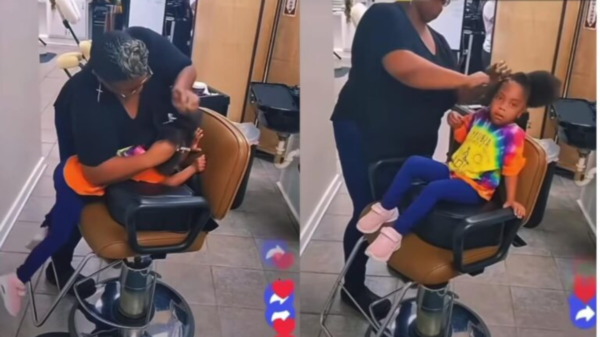 hairstylist braiding small girl’s hair