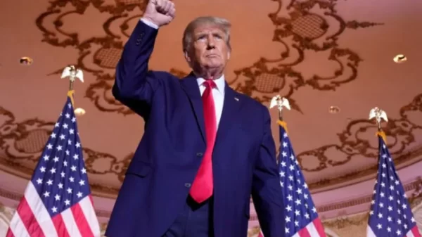 Former President Donald Trump gestures after announcing he is running for president for the third time as he speaks at Mar-a-Lago in Palm Beach, Fla., Nov. 15, 2022. (AP Photo/Andrew Harnik)