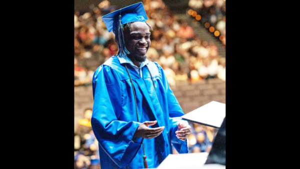 Malik Childs receives Diploma