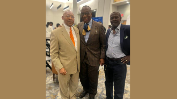 Secretary Jackson with Comm. Price and John Proctor of the Black Contractors.