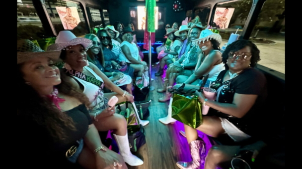 Attendees all smiles along party bus tour