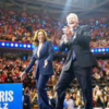 Kamala Harris and Tim Walz being joyous with audience. (1)