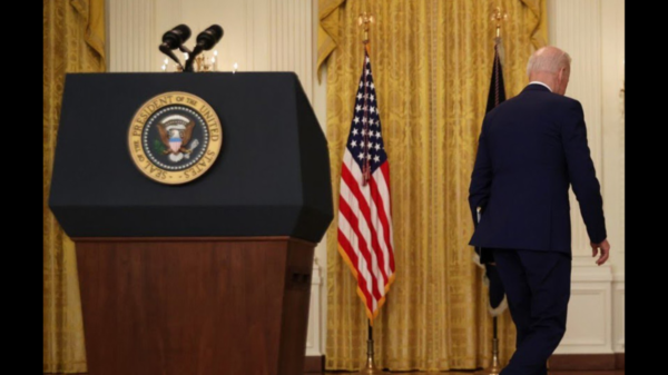 President Joe Biden, walking away from podium.