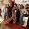 Cheryl Polote Williamson with family and friends during Ageless, Fearless, Unscripted podcast screening in Dallas Sept. 13, 2024