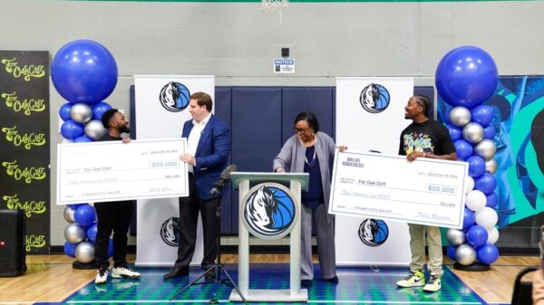 For Oak Cliff Accepts $100,000 check presentations from Dallas Mavericks