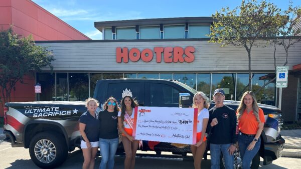 DFW Hooters donates nearly $3,500 to Guns and Hoses Foundation of North Texas