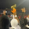 The South Oak Cliff Bears raise their trophy high after claiming a spot in their fourth consecutive state championship